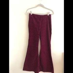 Pink flared pants by Italian brand momoni